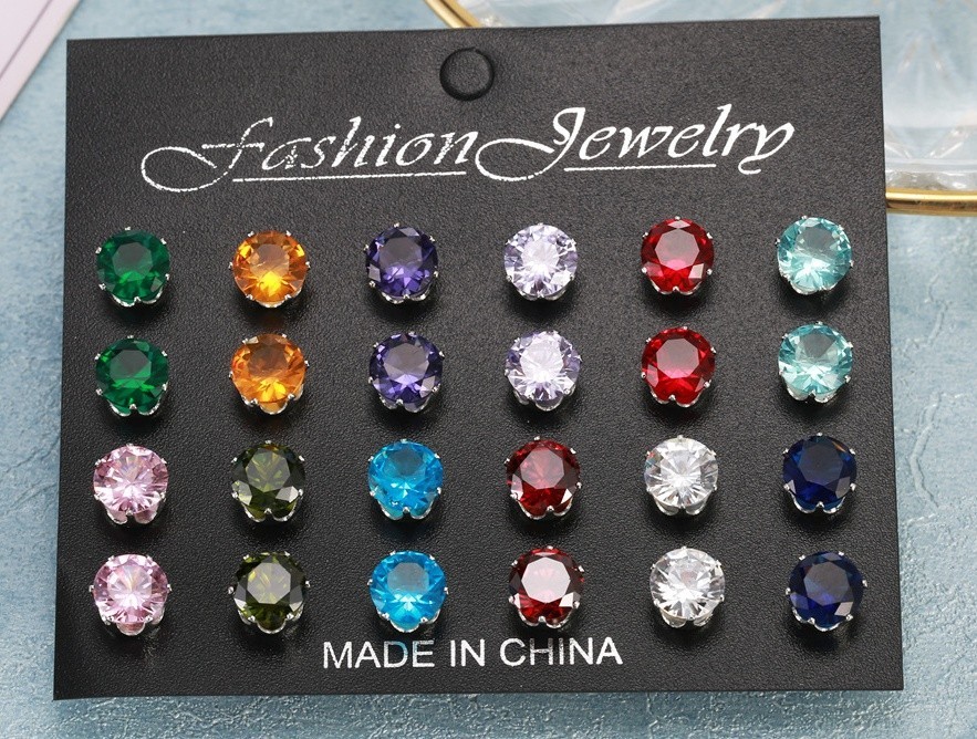 Venta al por mayor Un conjunto de 12 pares de pendientes de cristal de color transparente brillantes Reino Unido