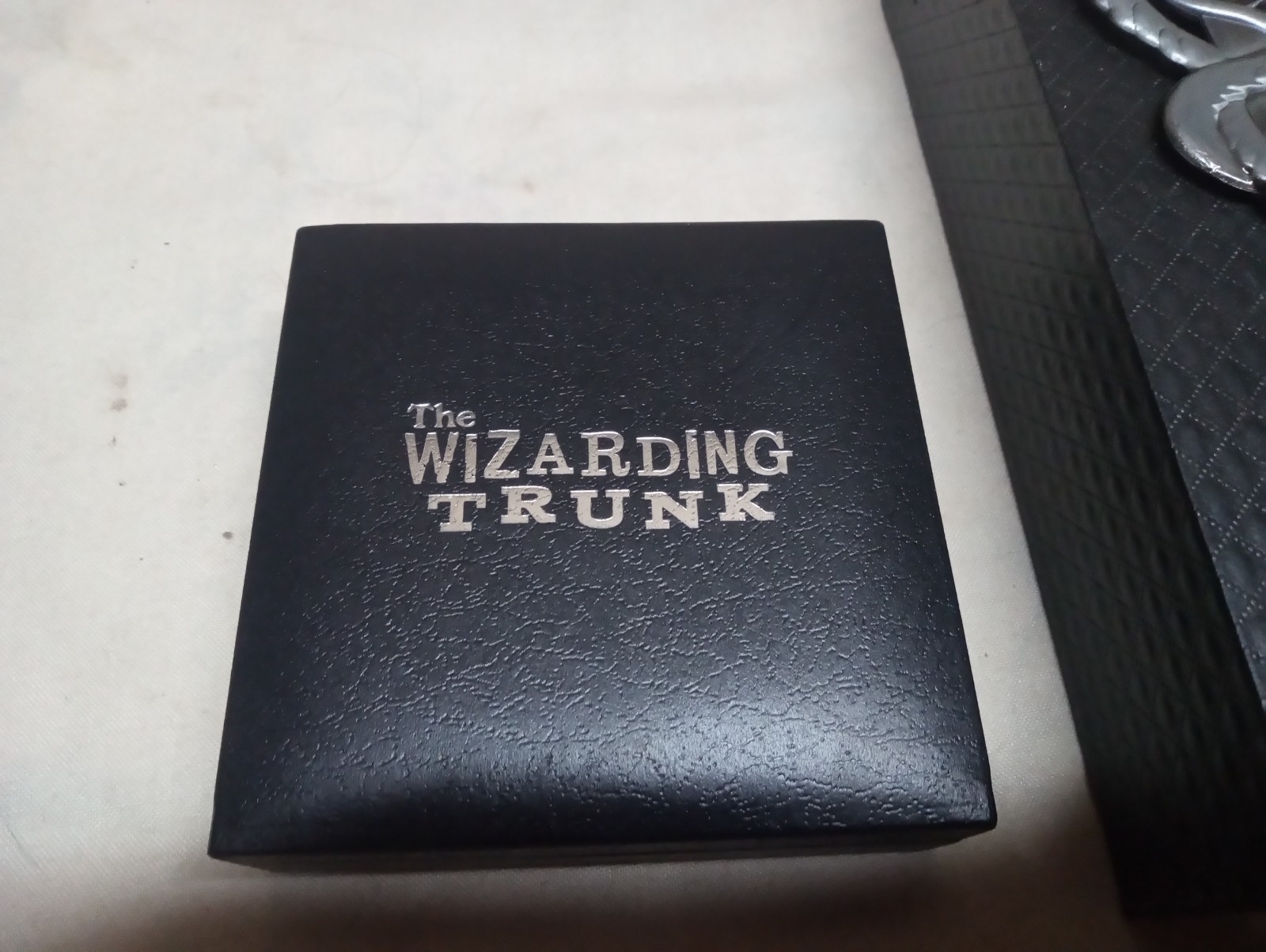 Harry Potter collectible lot, wizarding world trunk, pendant, keys, charms, more