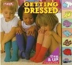 GETTING DRESSED: TAB BOARD BOOK (TAB BOARD BOOKS) By Playskool **Excellent**