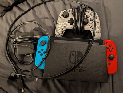 Nintendo Switch Console w/ Dock, Red/Blue Joy-Con, Pro Controller, AC Adapter