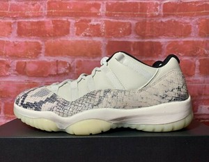 air jordan 11 low snakeskin light bone/university red men's shoes