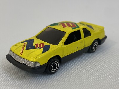 Vintage Yatming #810 Yellow Chevy Lumina 1/64 Diecast Plastic