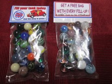 2 BAGS OF REBBEL / GASOLINE  OIL PROMO MARBLES