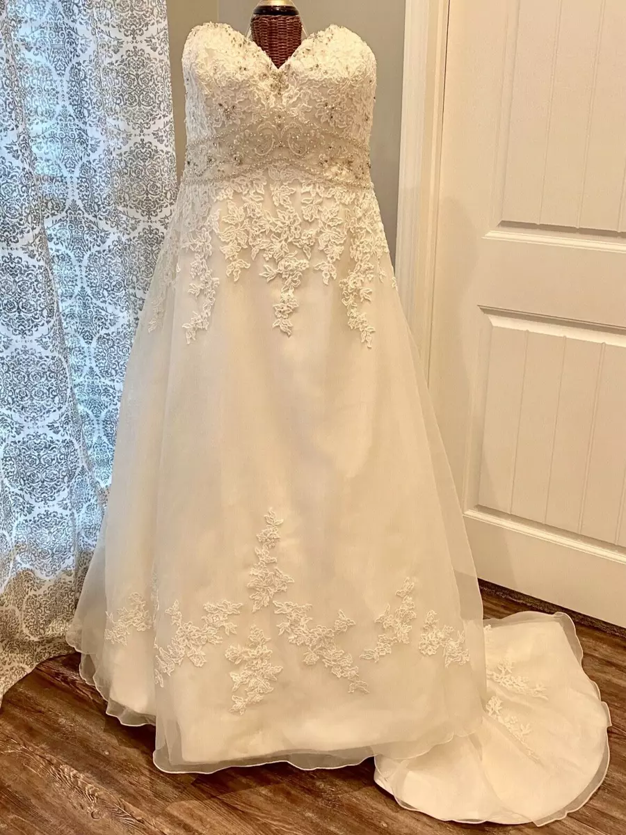 How much are top madeline gardner wedding dresses