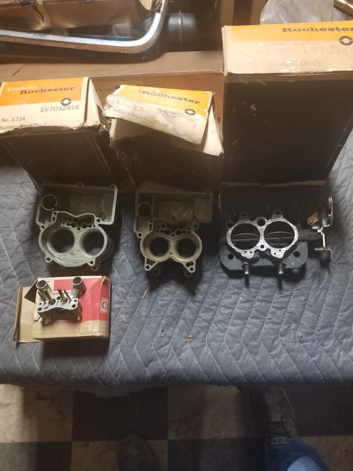 NOS GM PARTS LOT 2- FLOAT BOWLS 1- THROTTLE BODY 1-VENTURIA NOS