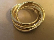 VINTAGE ESTATE thick gold tone circle of life brooch