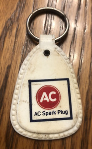 vintage 1976 AC Spark Plug Keychain Flint Michigan ￼