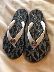 michael kors jet set jelly flip flops black