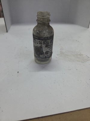 Pennsylvania collectible glass bottle containing crude oil from the Drake Well 
