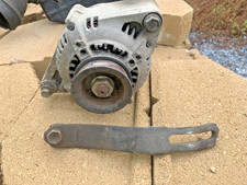 27060-65040 Denso OEM Alternator from 1993 Toyota 4Runner. With mounting bracket