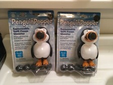 Hog Wild PENGUIN POPPER Squeezable SOFT FOAM SHOOTER 2012 Best Toys NEW NIP Pair