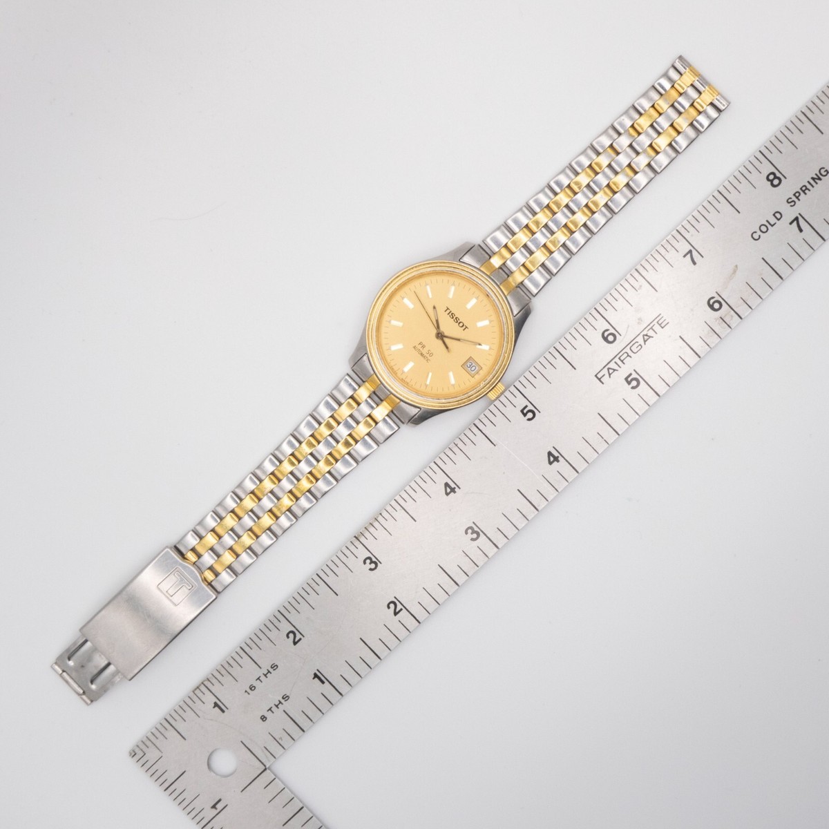 ゆう　TISSOT PR 50 自動巻き腕時計 Tissot PR50 25-Jewel Goldtone & St. Steel Automatic