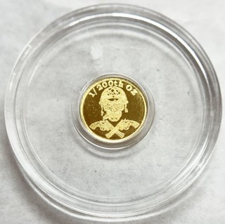 US SKULL & EAGLE GOLD 1/200 oz 9999 FINE ROUND IN CAPSULE