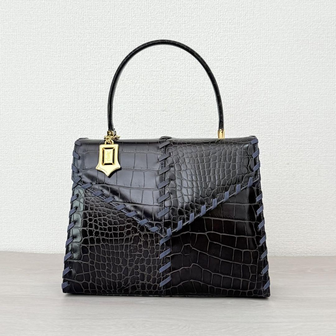 Borsa Yves saint Laurent coccodrillo viola in rilievo cuciture usata