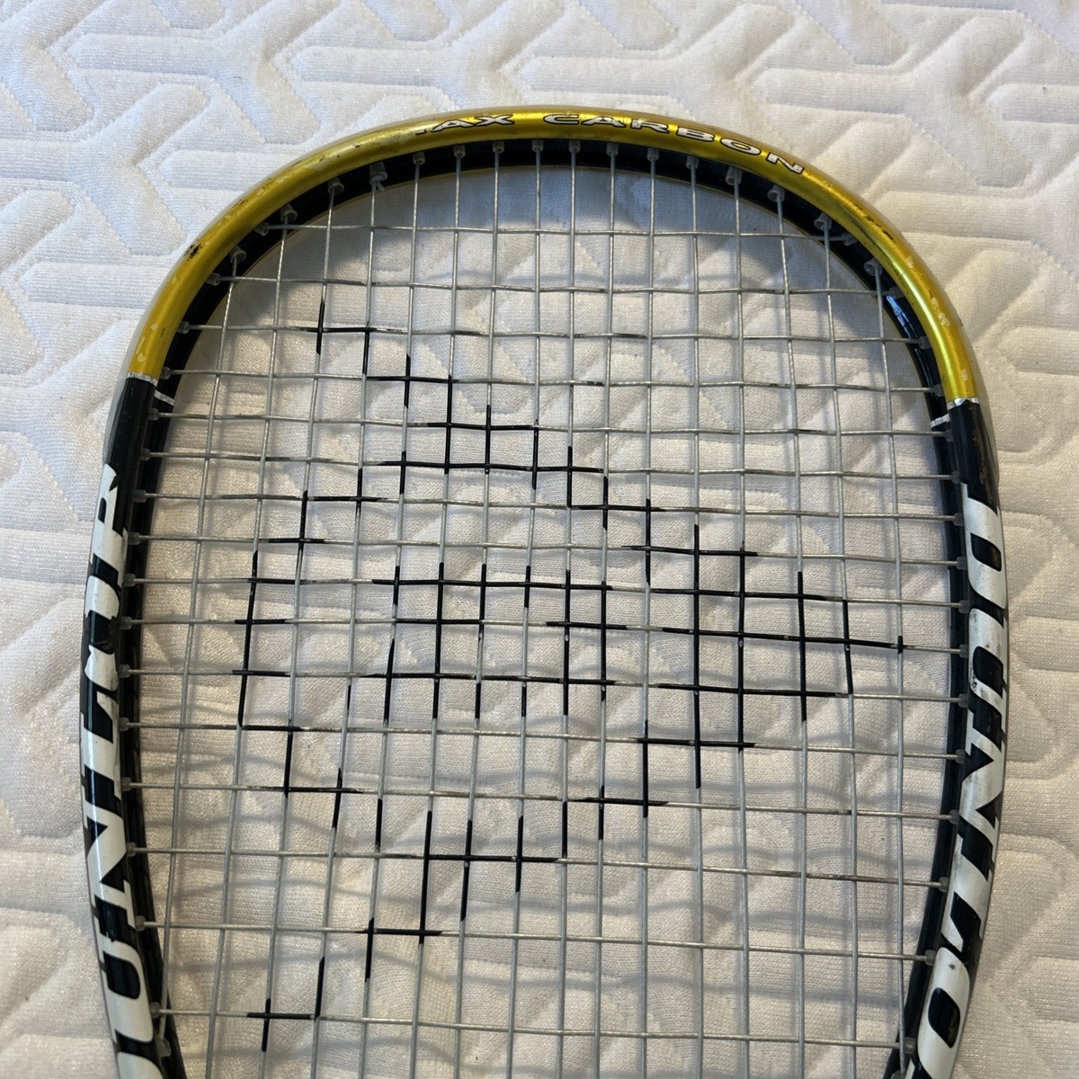 Raquette de courge Dunlop C-Max carbone 525 cm2 taille tête tissage