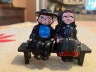 Vtg Dalecraft cast iron metal Amish Man/Woman on Bench Salt & Pepper Shakers — photo 1