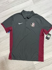 Charcoal Nike Dri-FIT polo. Sleek and breathable design.