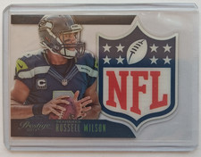 2014 Prestige Russell Wilson NFL Shield #23 Seahawks Insert NM