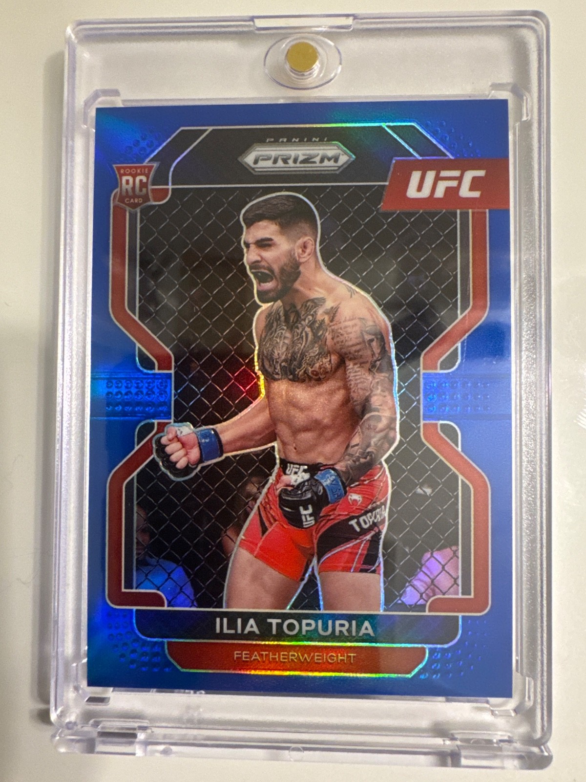2022 Panini Prizm UFC - Ilia Topuria #115 Blue Prizm /199 (RC)