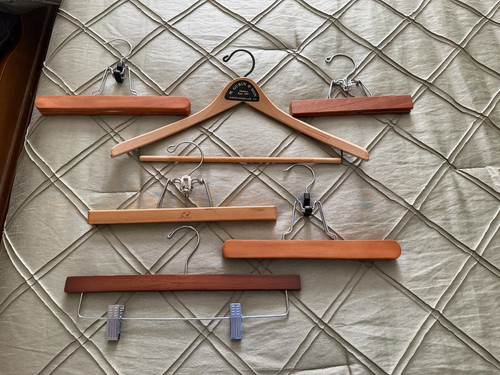 5 vintage wooden pants hangers, incl Setwell; one Northumberland Pa coat hanger