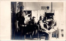 RPPC Germany Men in uniform in office