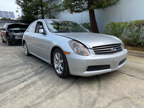 03-04 INFINITI G35 Sedan Steering Column Trim Black/G OEM 48470AM602 - Picture 3 of 12