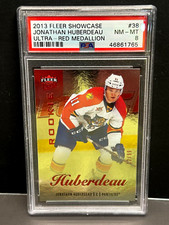 Jonathan Huberdeau 2013-14 Fleer Showcase Ultra Red Medallion Rookie 12/99 PSA 8