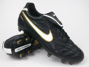 nike black gold boots
