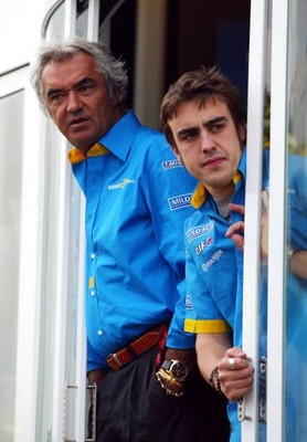 Renault boss Flavio Briatore with Fernando Alonso of Spain wait in- Old Photo 1