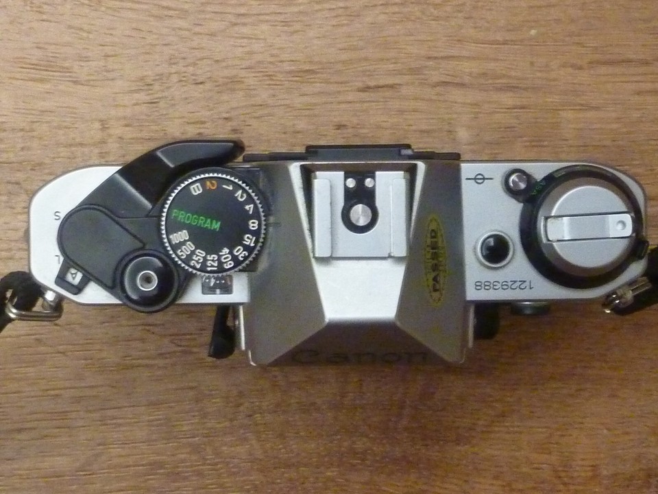 Canon AE1 Program SLR Film Camera Works but Broken Battery Door for