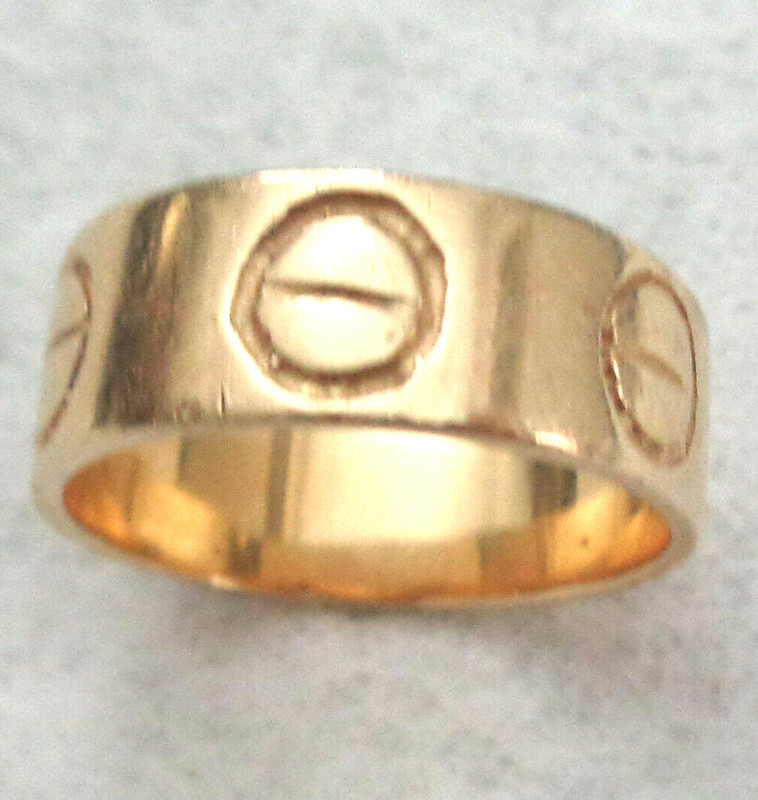 14KT RING WITH LOVE  EMBLEM ALL AROUND , RING SIZE 4.5  WIDTH 1/4"  WT. 3.5 GR