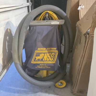 NSS Model M-1 ''Pig'' commercial heavy-duty canister vacuum cleaner