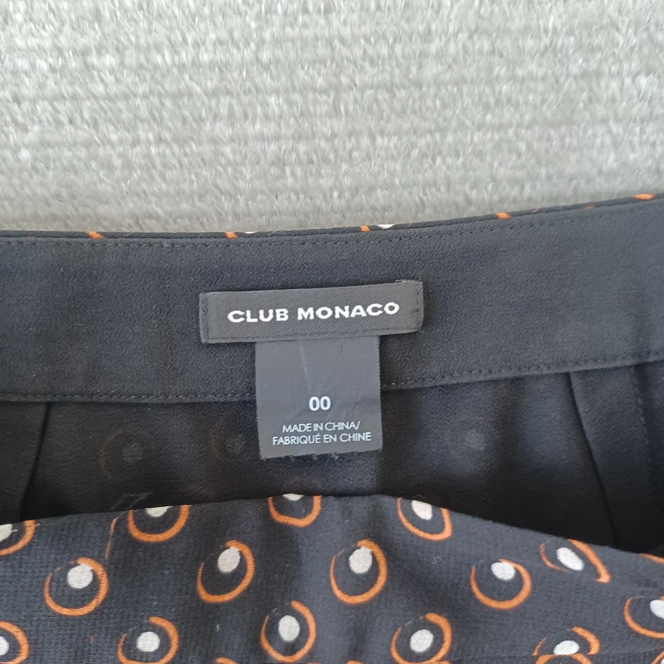 Falda Club Monaco Mujer 00 Negra Estampado Circular Midi Dobladillo Flutter Seda Oficina Foto 3 de 4
