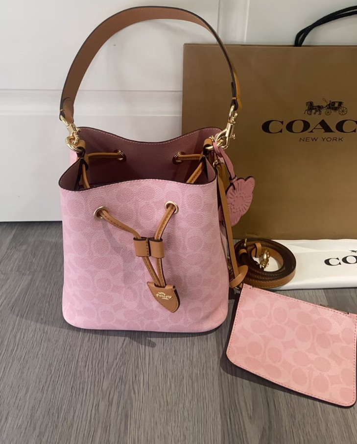 NWT Coach CEA23 Rowan Bucket Bag In Signature Canvas With Charms Powder Pink