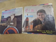 2 EP singles; Janji Morandi "Knee to You" and "Singing Love"