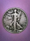 1934 S - Walking Liberty Half  Looks Grade Fine +