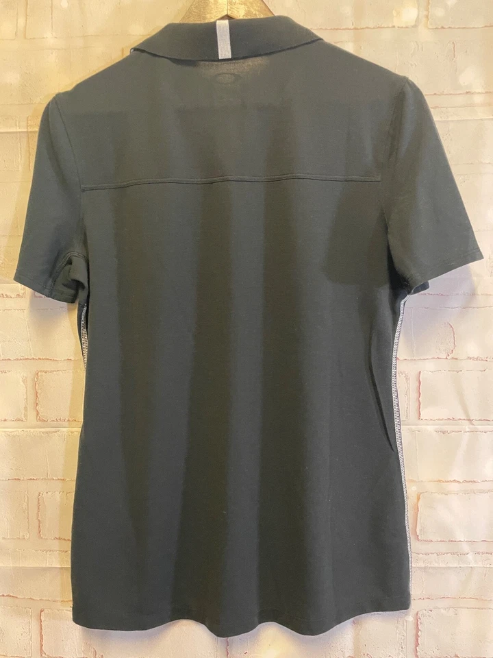 Blusa deportiva de golf Oakley blanca y negra con cuello para mujer mediana Foto 3 de 4