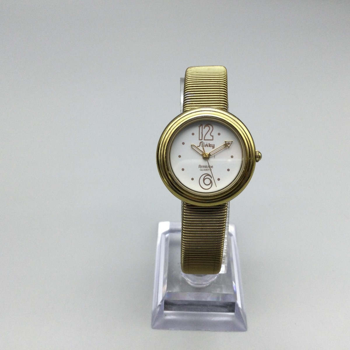 Vintage Armitron Slinky Watch Women 28mm Gold Tone Stretch  display picture 1