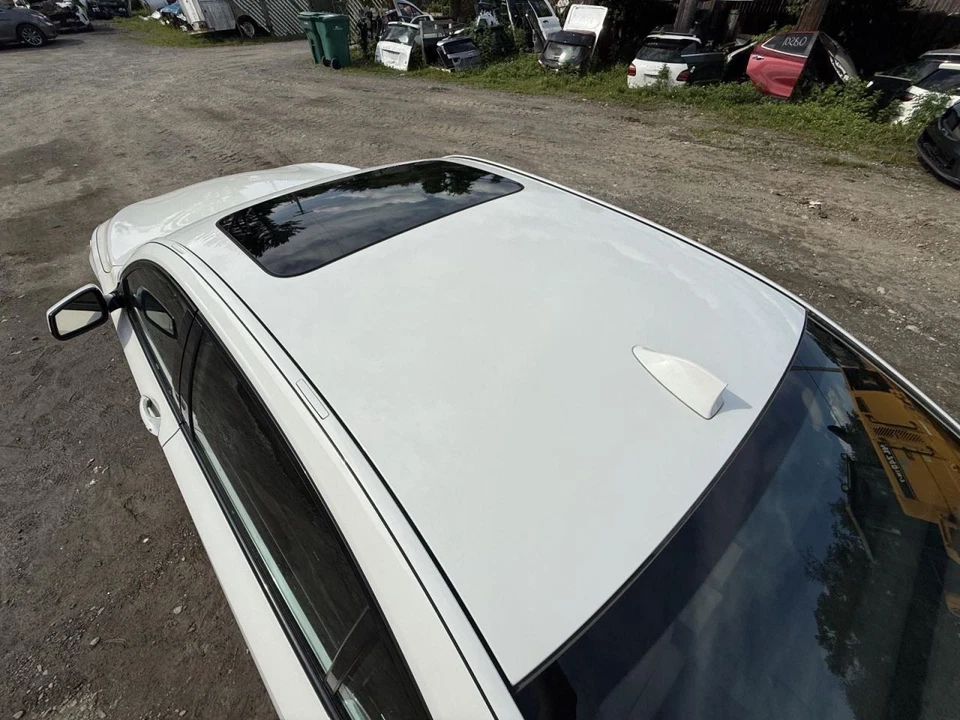 BMW 750i 2009-2015 techo con techo corredizo blanco Foto 2 de 4