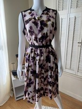Simply Vera Wang floral dress with v neck and button closure.