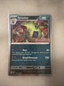 2023 Pokemon Paldea Evolved Stamped Cosmos Holo Rare Tyranitar 135/193