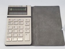 Vintage Texas Instruments TI-1768 Mini Compact Pocket Solar Calculator TESTED