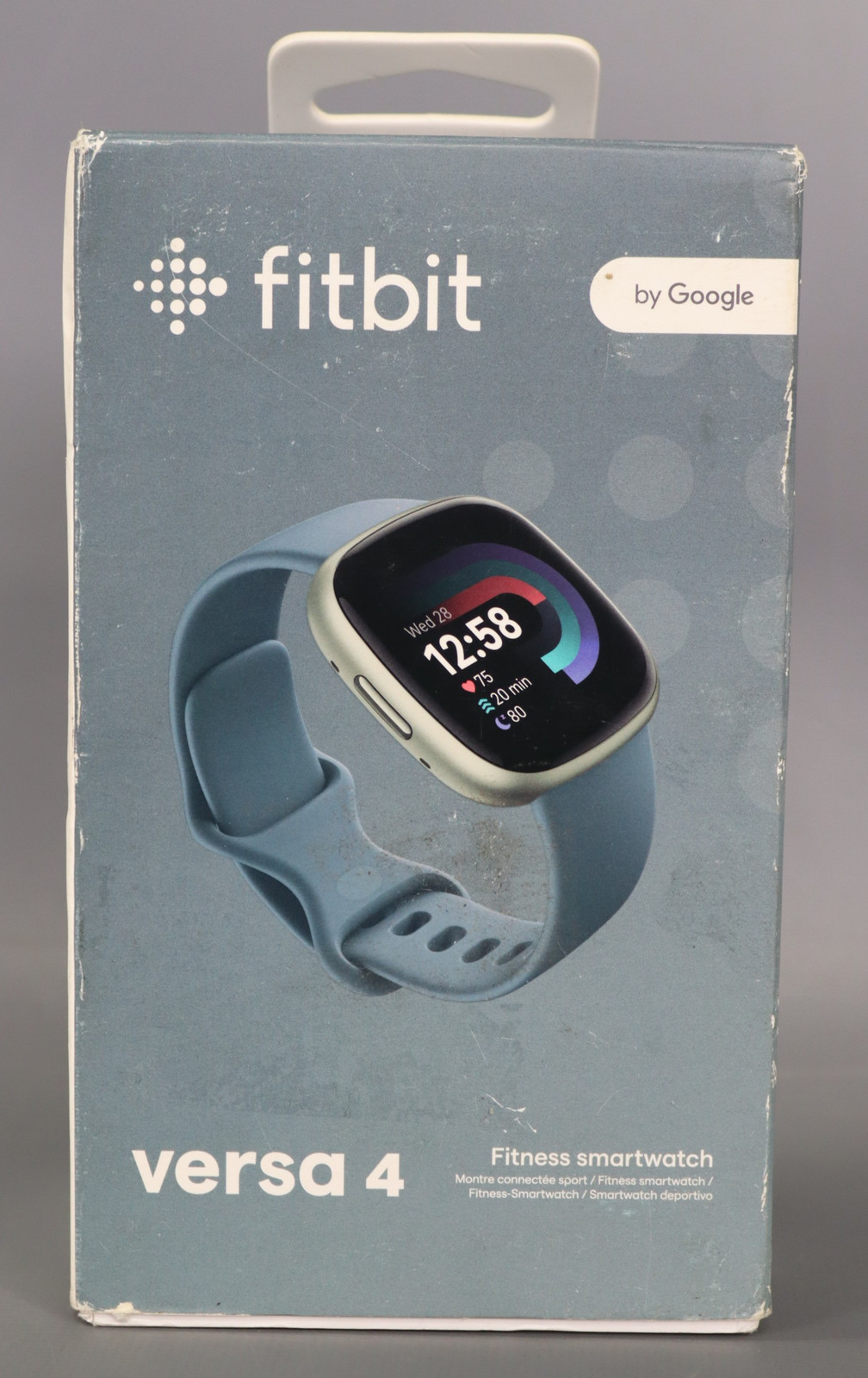 Fitbit Versa 4 Smartwatch - Platinum Aluminum with Waterfall Blue Band