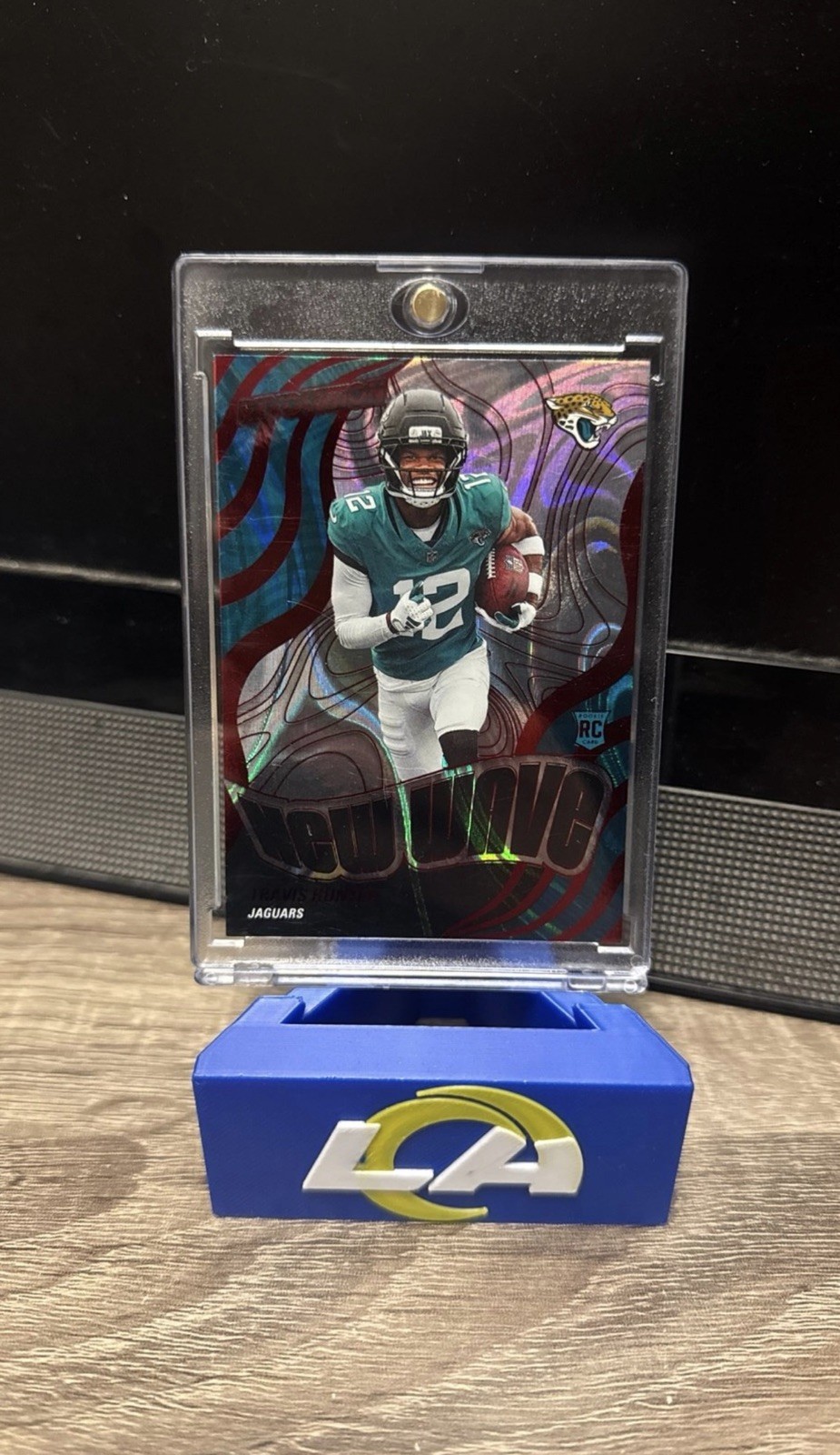 2025 Revolution New Wave Red Swirl Travis Hunter RC 43/50 - Jacksonville Jaguars