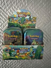 Pokemon display case with 8 tins