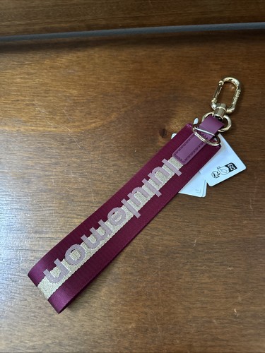 Lululemon Never Lost Keychain Wordmark DELX/GOLD/BONE - NWT - Picture 5 of 5