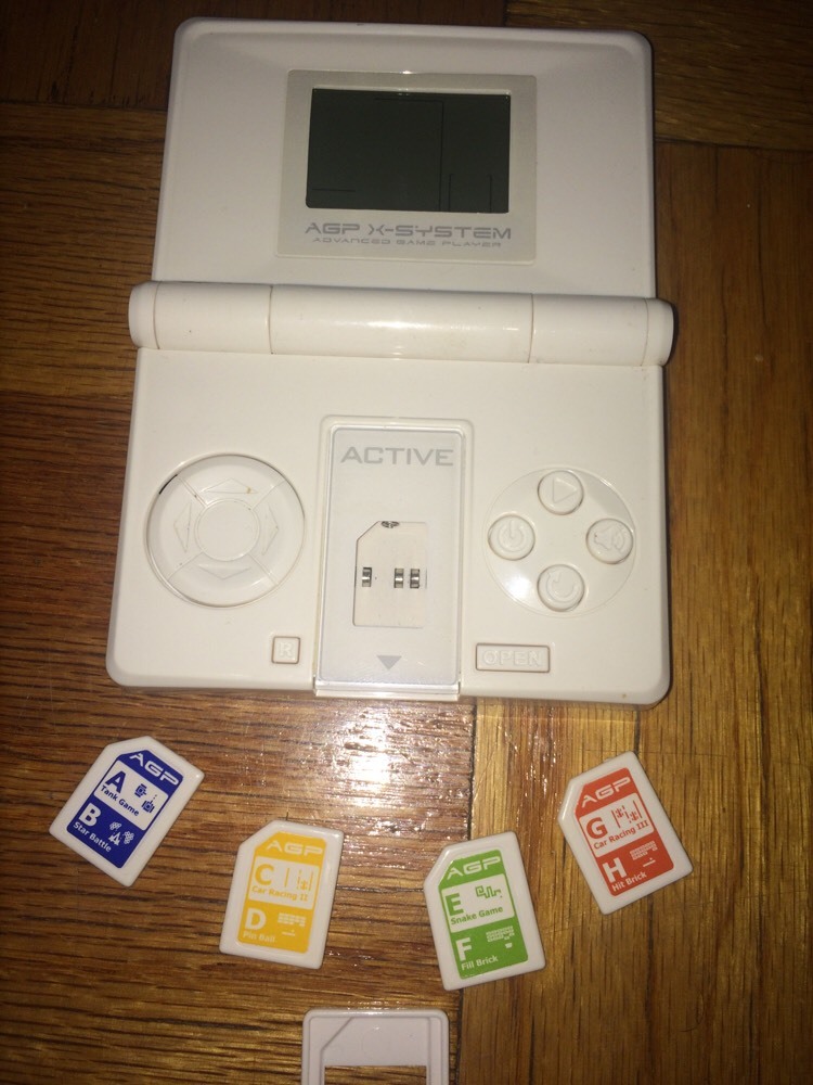 AGP X-System Advanced Game Player with 8 Games Condition | eBay