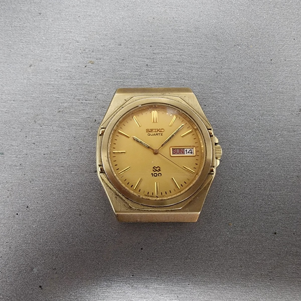 Seiko SQ 100 Watch Men 35mm Gold Dial Gold Tone Daydate Octagon
