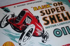 VINTAGE BANK🏦ON SUPER SHELL RACE CAR & DRIVER 16" PORCELAIN METAL GASOLINE SIGN