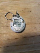 1997 Bandai Tamagotchi Angel Electronic. BN. Pearl W/gold Wings. TESTED N WORKI